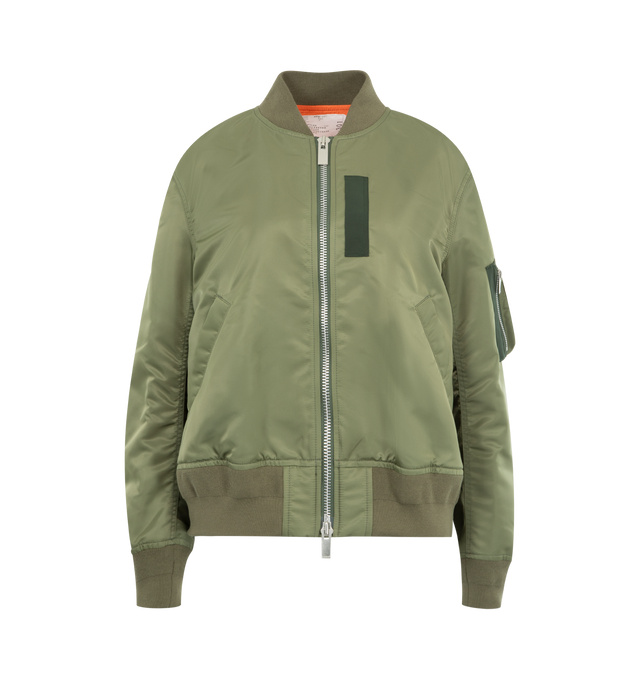 Image 1 of 3 - GREEN - SACAI Nylon Twill Blouson Bomber Jacket featuring rib-knit stand collar, hem, and cuffs, two-way zip closure, press-stud tabs at chest, welt pockets at front, press-stud vent at side seams, utility pocket at sleeve, welt pockets at interior and full satin lining. 100% nylon. Lining: 100% polyester. Made in Japan.