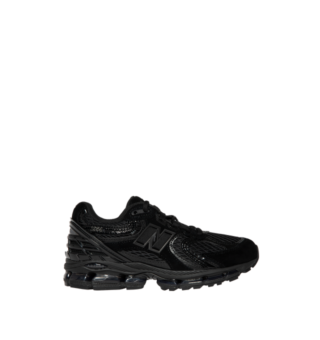 Image 1 of 5 - BLACK - New Balance 1954R Unisex Sneakers feature a suede and mesh upper inspired by the 2002 and 1906 models, combining breathable mesh with synthetic and pig suede overlays. ABZORB midsole cushioning absorbs impact through a combination of cushioning and compression resistance, while a traditional lace-up closure provides an adjustable fit. Upper: Synthetic, Mesh, and Pig Suede.