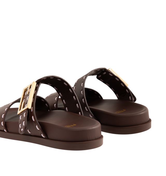 Image 3 of 4 - BROWN - FENDI Feel Slide Sandal featuring double-band flat slides with FF Baguette decorative buckle, hand-sewn contrasting macro Selleria topstitches and gold-finish metalware. 100% calfskin. Made in Italy.