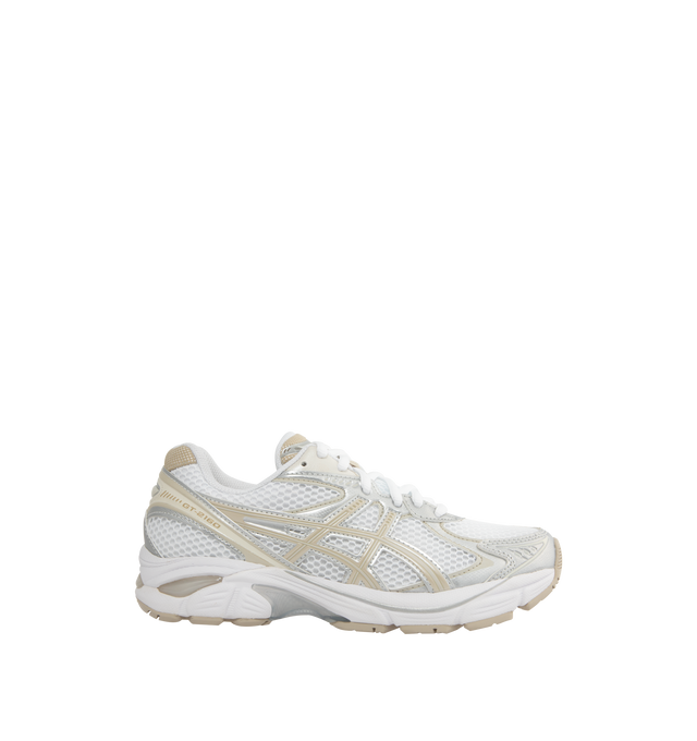 Image 1 of 5 - NEUTRAL - Asics GT-2160 sneaker with a sleek aesthetic and wavy forefoot sculpting, featuring a segmented midsole structure and GEL technology inserts for advanced cushioning. Unisex style in men's sizing.
