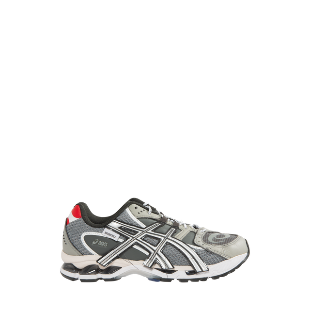 Image 1 of 5 - GREY - ASICS Gel-Nimbus 10.1 Sneaker featuring mesh upper, synthetic overlays, padded collar, Gel-Nimbus branding on tongue, formstripes on lateral sides, ASICS branding on lateral ankle, rope laces, branding on heel, GEL technology inserts, TRUSSTIC system, dual-layer EVA foam midsole and rubber outsole.