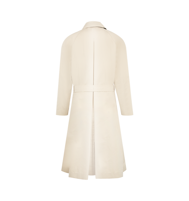 Image 2 of 3 - NEUTRAL - Tom Ford Men's Cotton and Silk Gabardine Trench Coat is crafted from a cotton and silk-blend gabardine and features a classic belted silhouette, black leather-trimmed throat latch, leather-covered belt buckle, and refined tailoring. This designer trench coat combines timeless outerwear styling with luxurious materials for elevated everyday and transitional wear. Main Material: Cotton and Silk-Blend Gabardine; Trim: Leather. Made in Italy.
