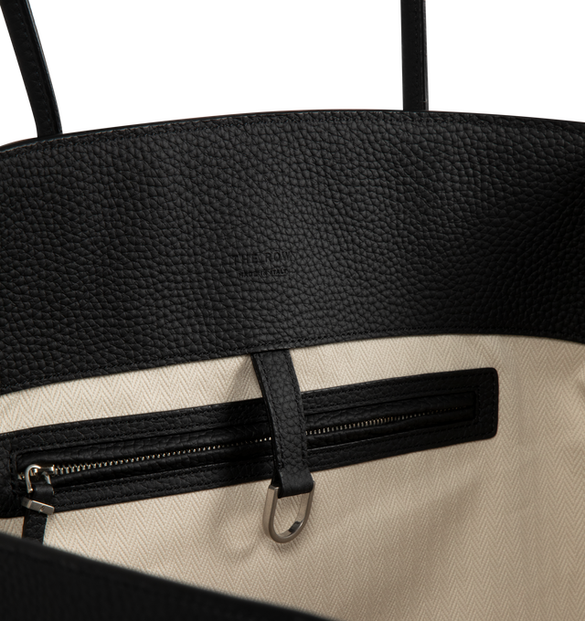 Image 3 of 3 - BLACK - THE ROW Marlo Bag featuring visible topstitching, silver finish, engraved logo, single compartment, shopper tote bag, hand carried, zippered interior pocket, thin strap and double handles. 43 cm x 30 cm x 23 cm. 100% buffalo leather. Lining: 100% cotton. Made in Italy.