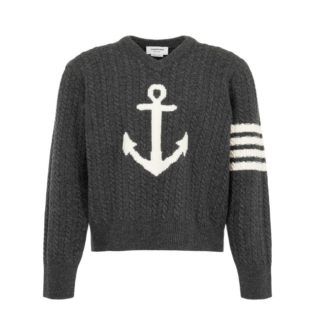 Image 1 of 2 - GREY - Thom Browne Men's Intarsia Anchor and Cable Relaxed V-Neck Pullover is crafted from virgin merino wool with cable-knit construction and jersey float jacquard for added texture. A contrast-stitched anchor intarsia, signature 4-Bar detailing, ribbed neckline, cuffs, and hem, and a striped grosgrain loop tab complete the design. Main Material: 100% Virgin Wool. Made in Italy.