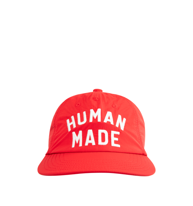 Image 1 of 2 - RED - HUMAN MADE 5 Panel Nylon Cap featuring a standard silhouette, thin, lightweight nylon fabric, soft brim, 5 panels, embroidered logo graphic on the front and rear adjuster for easy adjustments. 100% nylon.