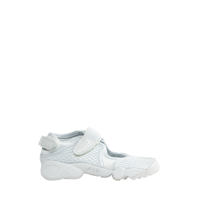 Image 1 of 5 - WHITE - Nike Women's Air Rift Sneaker featuring hook-and-loop straps on the midfoot and heel, Nike Air unit in the heel combined with plush foam, rubber detailing on the outsole, upper features a blend of elastane, polyester and nylon materials for a flexible fit and split toe design.