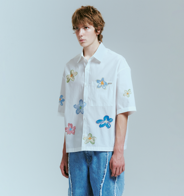 Image 3 of 4 - WHITE - NAHMIAS Super Bloom Cropped Shirt featuring front button closure, single chest pocket, midweight poplin fabric, spread collar and placed super bloom graphic. 100% cotton.