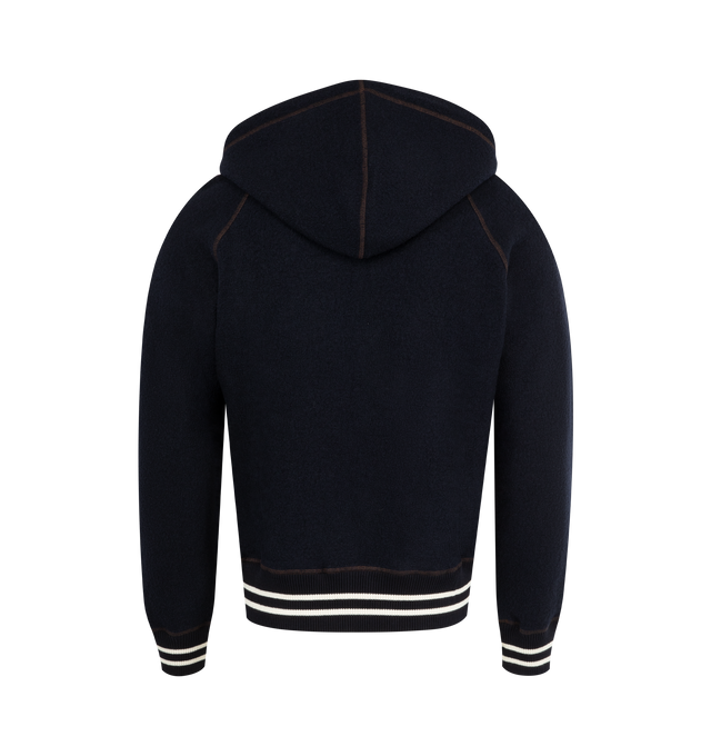 Image 2 of 2 - NAVY - WALES BONNER October Hoodie featuring full zip hoodie in navy wool with rust brown topstitching, contrast striped ribs and a jacquard drawstring. 100% wool.