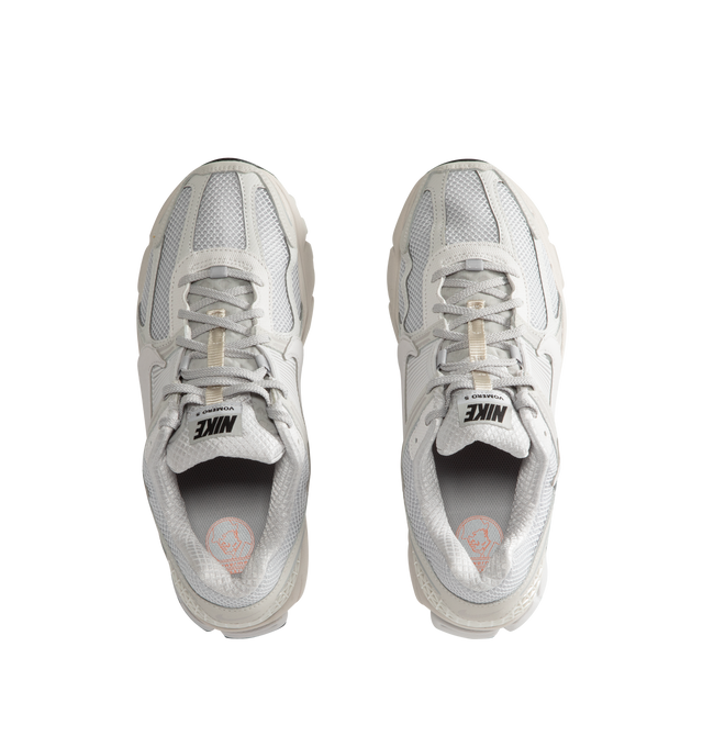 Image 5 of 5 - GREY - Nike Men's Zoom Vomero 5 SP Sneakers are a lace-up style with synthetic leather, mesh, rubber heel trim, and rubber outsole.