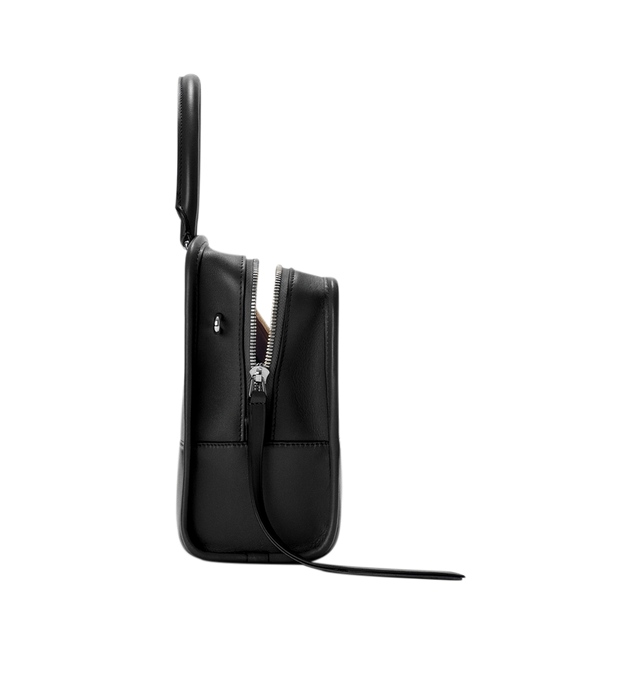 Image 8 of 17 - BLACK - Loewe Amazona Medium 180 Bag in soft calfskin leather featuring a relaxed silhouette with a single toron top handle, designed to be carried open, while a concealed closure secures the main compartment, removable shoulder and crossbody straps, zip closure with two leather zip pullers, two compartments, main compartment closed with magnetic closure, internal flat pocket, suede lining and embossed logo. Soft calfskin. Strap length 108 cm; Strap Drop 50 cm; Handle drop 11 - 28 cm; Height