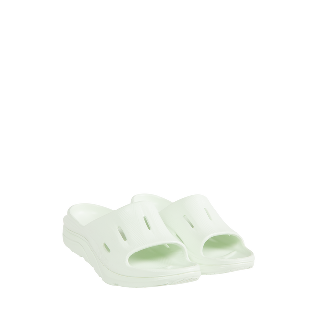 Image 2 of 4 - GREEN - HOKA Ora Recovery Slide 3 featuring perforated rubber upper with EVA sole, slip-on styling and molded footbed.