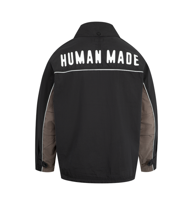 Image 2 of 3 - BLACK - HUMAN MADE Nylon Anorak Jacket featuring half-zip, wrinkled texture, packable hood with snap buttons on the collar, brand logo graphics, heart logo patch on the left chest, sleeve cut-outs, kangaroo pocket with a flap pocket and drawcord allows for silhouette adjustments. 80% cotton, 20% nylon.