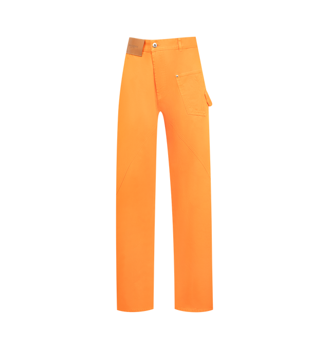 Image 1 of 3 - ORANGE - JW ANDERSON Twisted Workwear Jeans featuring a large leather logo patch, anchor stitched pocket, engraved metal shank buttons, logo rivets and orange binding. 100% cotton. Made in Japan.