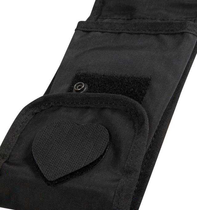 Image 4 of 4 - BLACK - HUMAN MADE Military Pouch featuring shoulder strap, lightweight and durable nylon Oxford fabric, heart-shaped magic tape, removing the tape reveals a text graphic, total of four pockets inside and out, brand logo appears on the shoulder strap and compact size for carrying a smartphone. 100% nylon.
