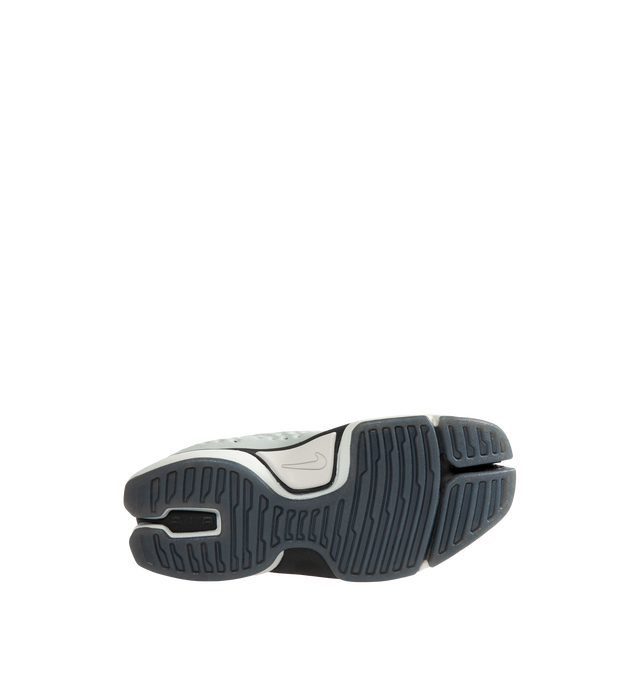 Image 4 of 5 - WHITE - Nike Women's Rift II Sneakers are a one-to-one reissue of the sought-after 2002 update to the iconic Air Rift and feature a streamlined slip-on silhouette, a flexible upper with breathable mesh underlays, and the signature split-toe design. This lightweight sneaker revives a cult-favorite look while maintaining the performance-inspired details that made the original a standout. Main Material: Textile and Synthetic Upper with Mesh Underlays.