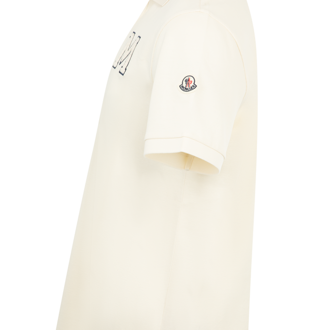 Image 3 of 3 - WHITE - MONCLER Stripe Polo featuring polo collar, 2 button placket, short sleeves, ribbed cuffs and collar and stripes on sleeve. 100% cotton.
