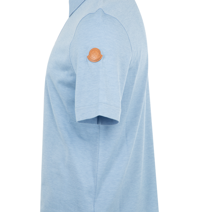 Image 3 of 3 - BLUE - MONCLER Double Leather Logo Cotton Polo Shirt featuring cotton blend piquet, short sleeves, snap button closure and leather logo patch. 50% cotton, 50% lyocell.