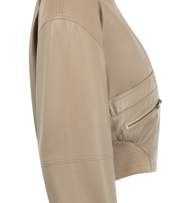 Image 3 of 3 - BROWN - CHLOE Crop Leather Bomber Jacket featuring strong padded shoulders, cropped silhouette, supple leather trimmed with wool-blend ribbing, diagonal zip and welt pockets, front zip closure, blade collar and cupro lining. Leather with 93% wool, 5% polyamide, 2% elastane rib trim. Made in Italy.