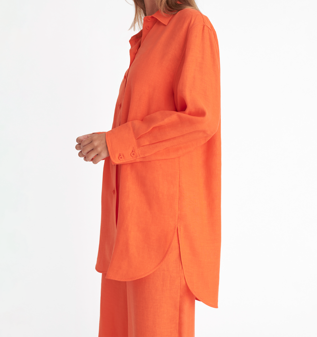 Image 3 of 4 - ORANGE - ERES Mignonette Shirt featuring long sleeves, pleated cuffs and yoke in the back with rounded slits on each side at the hem. 100% Linen. Made in Bulgaria. 