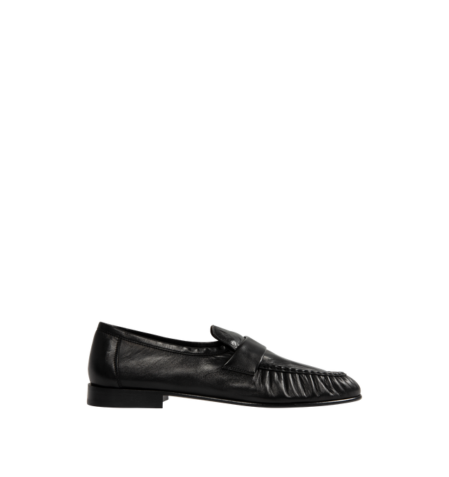 Image 1 of 4 - BLACK - THE ROW Soft Loafers featuring polished eel leather loafers, topstitching and gathering at moc toe, strap at vamp, logo stamp at footbed, suede lining, stacked leather block heel and hand-painted leather sole with rubber injections. Heel: H1". Leather. Made in Italy.