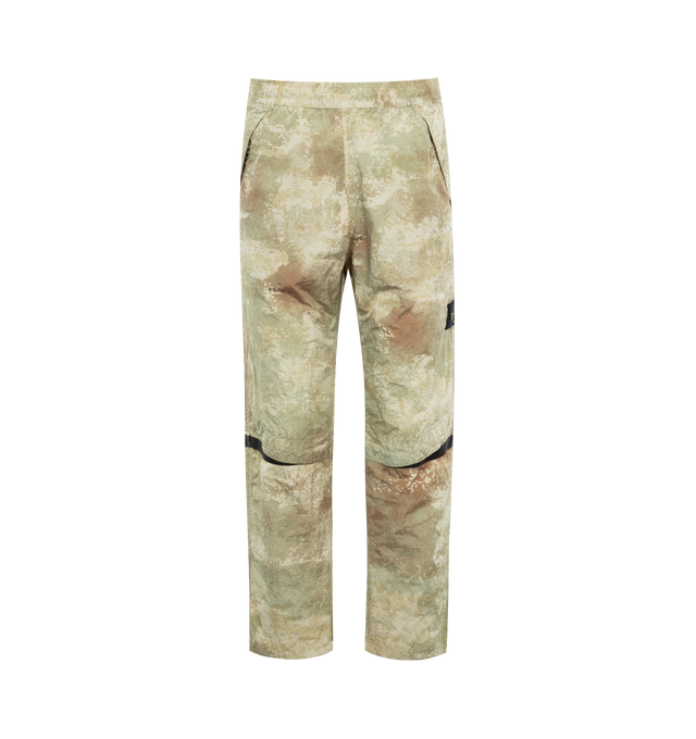 Image 1 of 3 - GREEN - STONE ISLAND Printed Trousers featuring ECONYL regenerated nylon taffeta, graphic pattern printed throughout, concealed drawstring at elasticized waistband, three-pocket styling, vent and webbing trim at knees, bungee-style drawstring at cuffs, detachable felted logo patch at outseam and full nylon mesh lining. 100% regenerated polyamide. Made in Viet Nam. 