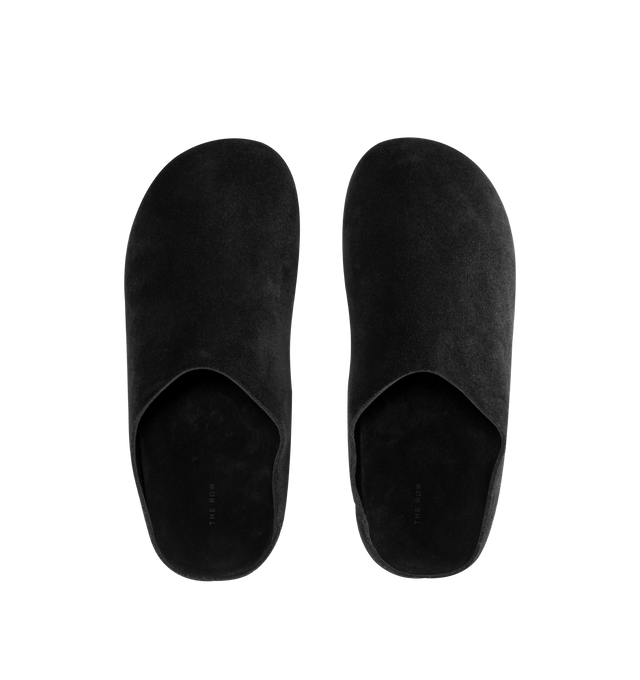 Image 4 of 4 - BLACK - THE ROW Hudson Slide featuring grained calfskin upper with rubber sole, slip-on styling, cushioned leather footbed, soft shearling with contoured footbed and rounded toe. Made in Italy.