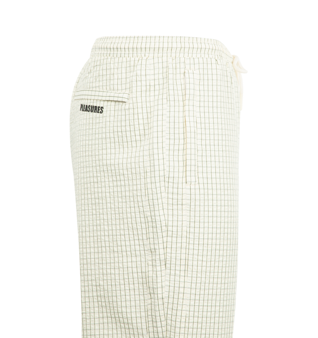 Image 3 of 3 - WHITE - PLEASURES Shifty Track Pant featuring relaxed fit, drawstring waistband, adjustable drawstring hems, two side pockets, single rear pocket and print throughout. 100% polyester.