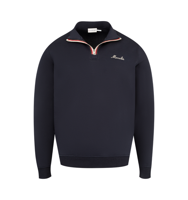Image 1 of 3 - NAVY - MONCLER Quarter Zip Sweatshirt featuring logo on front, logo patch on sleeve, long sleeves, ribbed hem and cuffs and quarter zip collar.