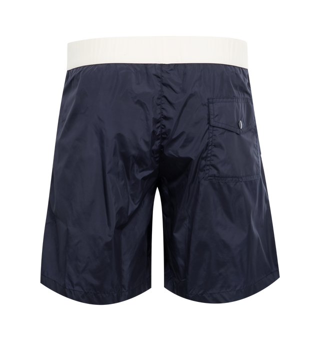 Image 2 of 3 - NAVY - MONCLER Contrast-Band Swim Shorts featuring elasticized drawstring waist, regular rise, side slip pockets, back flap pocket, relaxed legs, logo emblem on left leg and pull-on style. Nylon. Lining: Elastane/nylon.