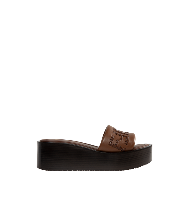 Image 1 of 4 - BROWN - FENDI Sunshine Platform Slide featuring wide-band, a platform sole and tone-on-tone leather threading that depicts the iconic FF motif. 100% calf leather. Made in Italy.