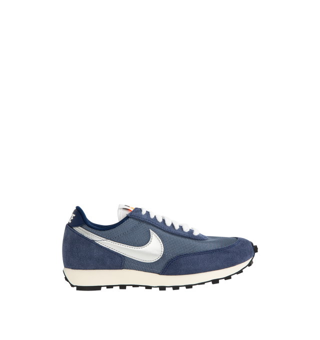 Image 1 of 5 - NAVY - Nike Men's Daybreak running shoe, inspired by the '70s running boom era, combining breathable mesh and shaggy suede with a vintage Waffle outsole. Calf Suede and fabric with rubber sole.