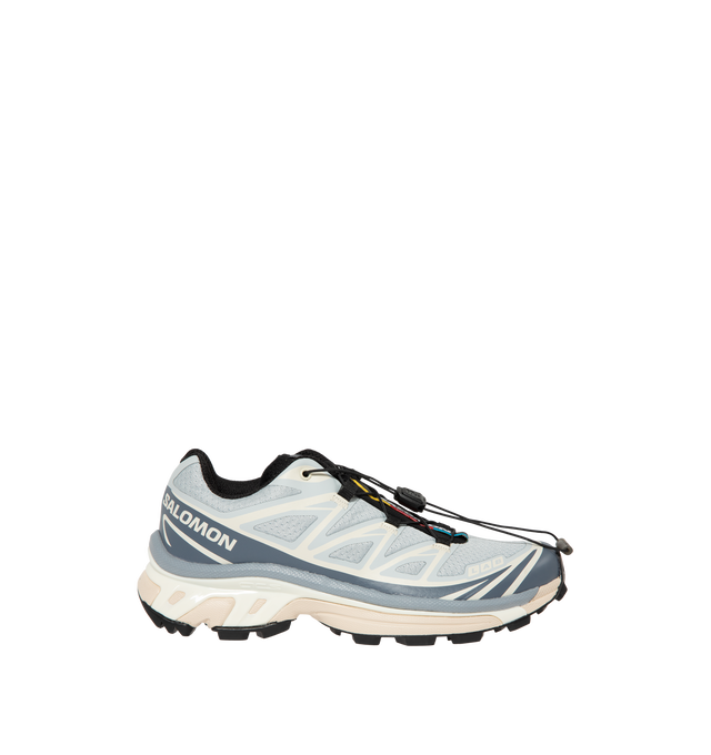 Image 1 of 5 - BLUE - Salomon Men's XT-6 Pearl Blue Sneakers are crafted with a lightweight textile and synthetic upper and feature the brand's Agile Chassis System, Quicklace technology, and advanced cushioning for exceptional stability and comfort. Originally developed for ultra-distance trail running, these designer sneakers combine technical performance with a distinctive Pearl Blue colorway, delivering superior support, durability, and all-terrain traction for both outdoor adventures and everyday wear.