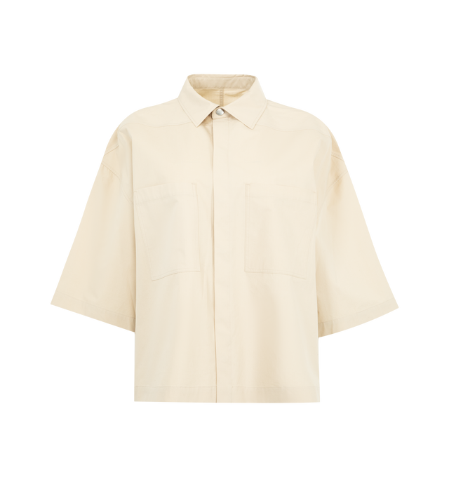 Image 1 of 2 - NEUTRAL - RICK OWENS Tommy Shirt featuring elongated short sleeves, pointed collar, concealed button closure, two chest pockets and straight hem.