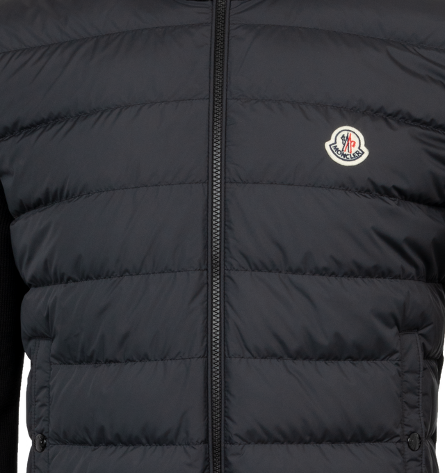 Image 3 of 3 - BLACK - MONCLER Padded Cardigan featuring lightweight micro chic lining, down-filled, stocking stitch, Gauge 7, zipper closure, vertical welt pockets with snap button closure and embossed embroidery. 100% polyester. 100% cotton. Padding: 90% down, 10% feather.