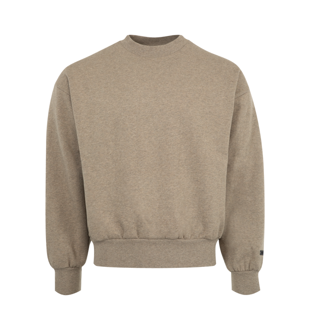 Image 1 of 2 - BROWN - FEAR OF GOD ESSENTIALS Classic Fleece Crewneck featuring 380gsm core fleece, classic fit with signature Fear of God relaxed proportions, new "Essentials Fear of God" beveled metallic logo is branded across the back, rib-knit collar, cuffs, and waist-hem and rubberized label is stitched on the sleeve. 80% cotton, 20% polyester fleece.