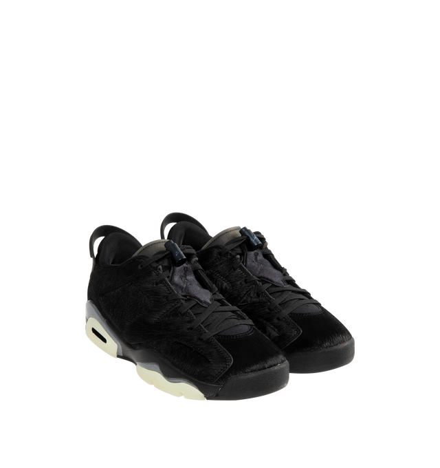 Image 2 of 5 - BLACK - JORDAN Air Jordan 6 Low Sneaker featuring leather and textile upper with pony hair and rubber sole, lace-up closure, padded low-cut collar, triple-black palette, translucent outsole and rounded toe.