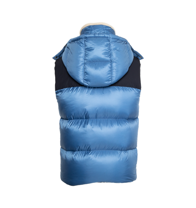 Image 2 of 3 - BLUE - MONCLER Oust Down Gilet featuring recycled micro ripstop lining, down-filled, detachable and adjustable hood with teddy lining, zip closure, zipped pockets, patch pocket on the chest and elastic armholes and hem. 100% polyamide. Collar: 79% polyester, 21% wool. Yoke: 100% polyester. Padding: 90% down, 10% feather. 