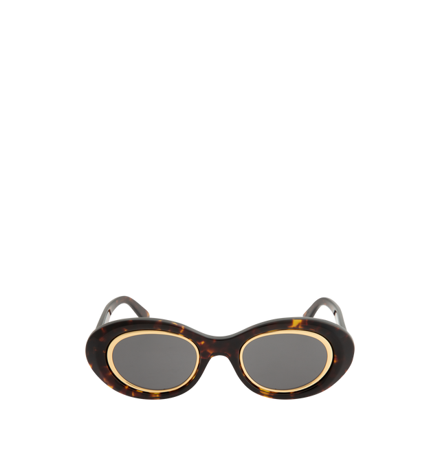 Image 1 of 3 - BROWN - LOEWE Mini Anagram Oval Sunglasses featuring mini oval-shape, acetate with a metal inner rim, adjusted fit, UVA/UVB protection and gold-finish metal Anagram. Acetate. Made in Italy.