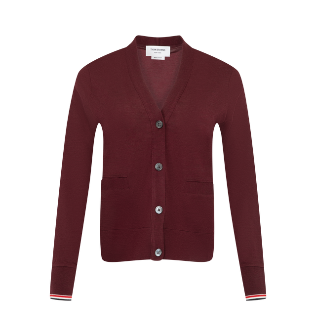 Image 1 of 2 - RED - Thom Browne Womens Fine Cashmere Cardigan is crafted from fine cashmere jersey and features a front button closure, welt hand pockets, rib-knit cuffs with signature RWB tipping, a rib-knit hem, and the signature striped grosgrain loop tab. This designer cashmere cardigan combines a timeless button-front silhouette with iconic Thom Browne detailing for elevated everyday layering. Main Material: 100% Cashmere. Made in Italy.