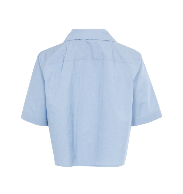 Image 2 of 3 - BLUE - LOEWE PAULA'S IBIZA Cropped Shirt featuring lightweight textured cotton poplin, relaxed fit, cropped length, classic collar, short sleeves, button front fastening, chest patch pocket and Anagram ajour embroidery placed on the chest pocket. Cotton/polyamide. Made in Portugal. 