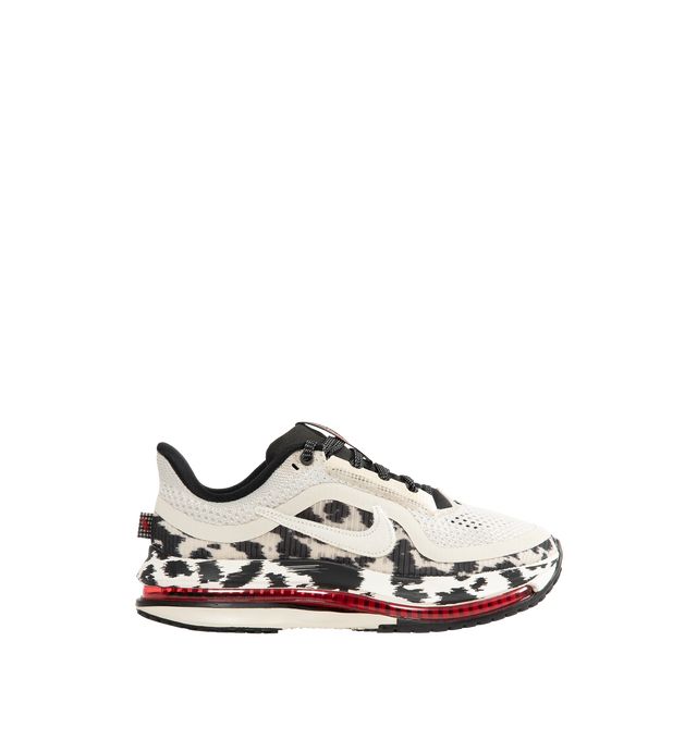 Image 1 of 5 - MULTI - Nike Women's Pegasus Premium Road Running Shoes feature a circular knit upper engineered for lightweight breathability and a foam interior cushion for comfort. Upper: Knit Textile. Outsole: Rubber. Heel-to-Toe Drop: 10 mm.