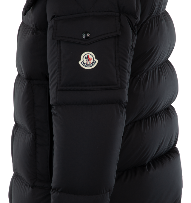 Image 3 of 3 - BLACK - MONCLER Vezere Short Down Jacket featuring recycled longue saison, nylon lger brillant lining, down-filled, detachable and adjustable hood, zipper and snap button closure, zipped pockets, patch pocket on the sleeve, adjustable cuffs and hem with drawstring fastening. 100% polyamide/nylon. Padding: 90% down, 10% feather.