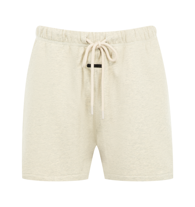 Image 1 of 3 - NEUTRAL - Fear of God Essentials Womens Classic Sweatshorts are crafted from heavyweight cotton fleece with a pigment-dyed finish. Feature a relaxed classic fit, elasticized waistband with adjustable drawcord and bungee, side-seam pockets, and signature Essentials label. Main Material: 100% Cotton. Imported.