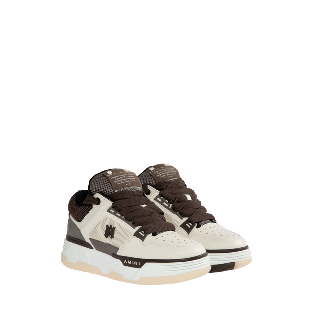 Image 2 of 5 - BROWN - AMIRI MA-1 Platform Skate Sneakers featuring platform heel, round toe, star-shaped perforations, chunky lace-up vamp, branded label at the tongue, padded collar and tongue, MA monogram on the side and rubber outsole. 