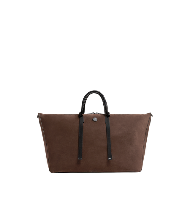 Image 1 of 3 - BROWN - MONCLER Carlo Suede Duffle Bag featuring micro suede lining, leather trim, leather handles, adjustable and detachable shoulder strap, inner pocket with snap button closure and embossed logo. L 42 cm x H 31 cm x D 22 cm. Leather. Lining: 91% polyester, 9% elastane/spandex. Made in Italy.