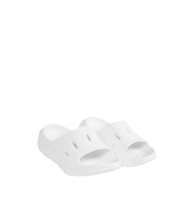 Image 2 of 4 - WHITE - HOKA Ora Recovery Slide 3 featuring perforated rubber upper with EVA sole, slip-on styling and molded footbed.