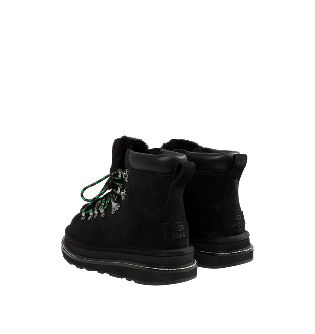 Image 3 of 4 - BLACK - UGG x sacai hiker boots designed for everyday wear, combines UGG's iconic premium  suede with sacai's unmistakable hybridized aesthetic. Upper is made with suede sourced from certified farms that practice regenerative agriculture upper. Midsole incorporates sugarcane EVA. Features Vibram XS Trek Evo. Unisex style in women's sizes.