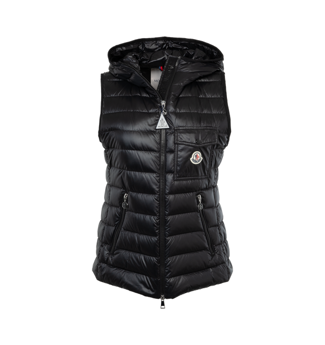 Image 1 of 2 - BLACK - MONCLER Glygos Down Vest featuring longue saison lining, down-filled, hood, inner front flap, zipper closure and chest pocket with snap button closure. 100% polyamide/nylon. Padding: 90% down, 10% feather. 
