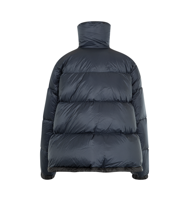 Image 2 of 3 - NAVY - SACAI Short Puffer Jacket featuring quilted nylon, stand collar, zip front closure, welt pockets and drawstring waist and hem. Nylon; polyester combo. Fill, down/feather.