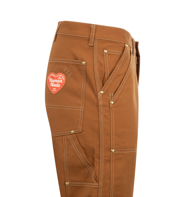 Image 3 of 3 - BROWN - HUMAN MADE Duck Work Trousers featuring front button and zip fastening, mid-rise, belt loops, two diagonal pockets to the sides, mini logo tag, two rear patch pockets, logo patch to the rear and straight leg. 100% cotton.